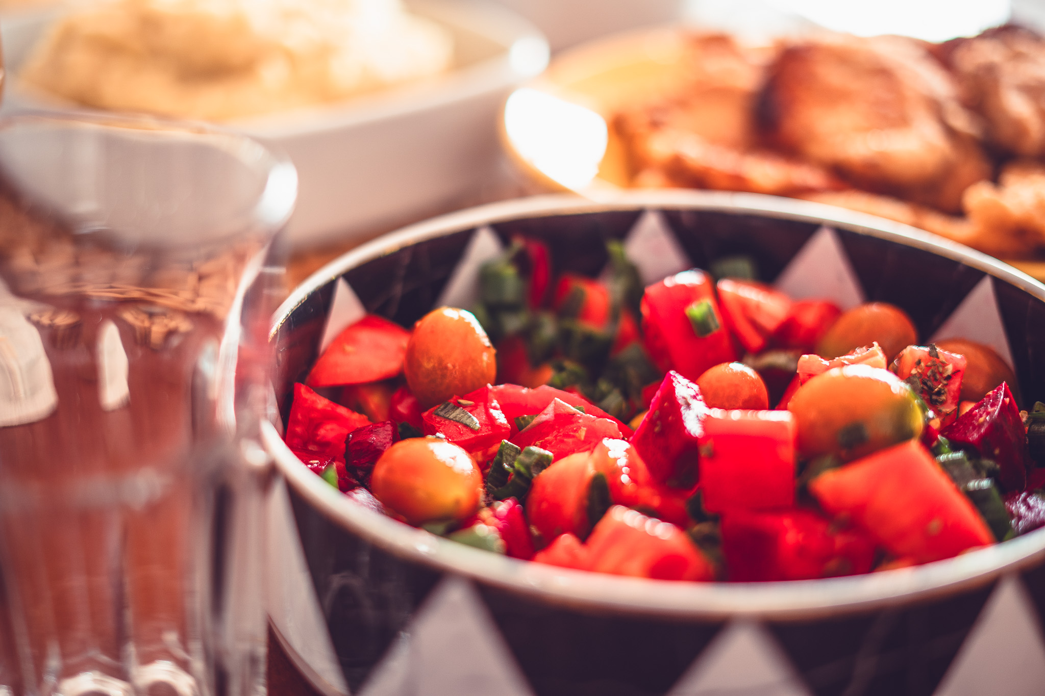 Bowl of fresh tomato and red pepper salad from the garden