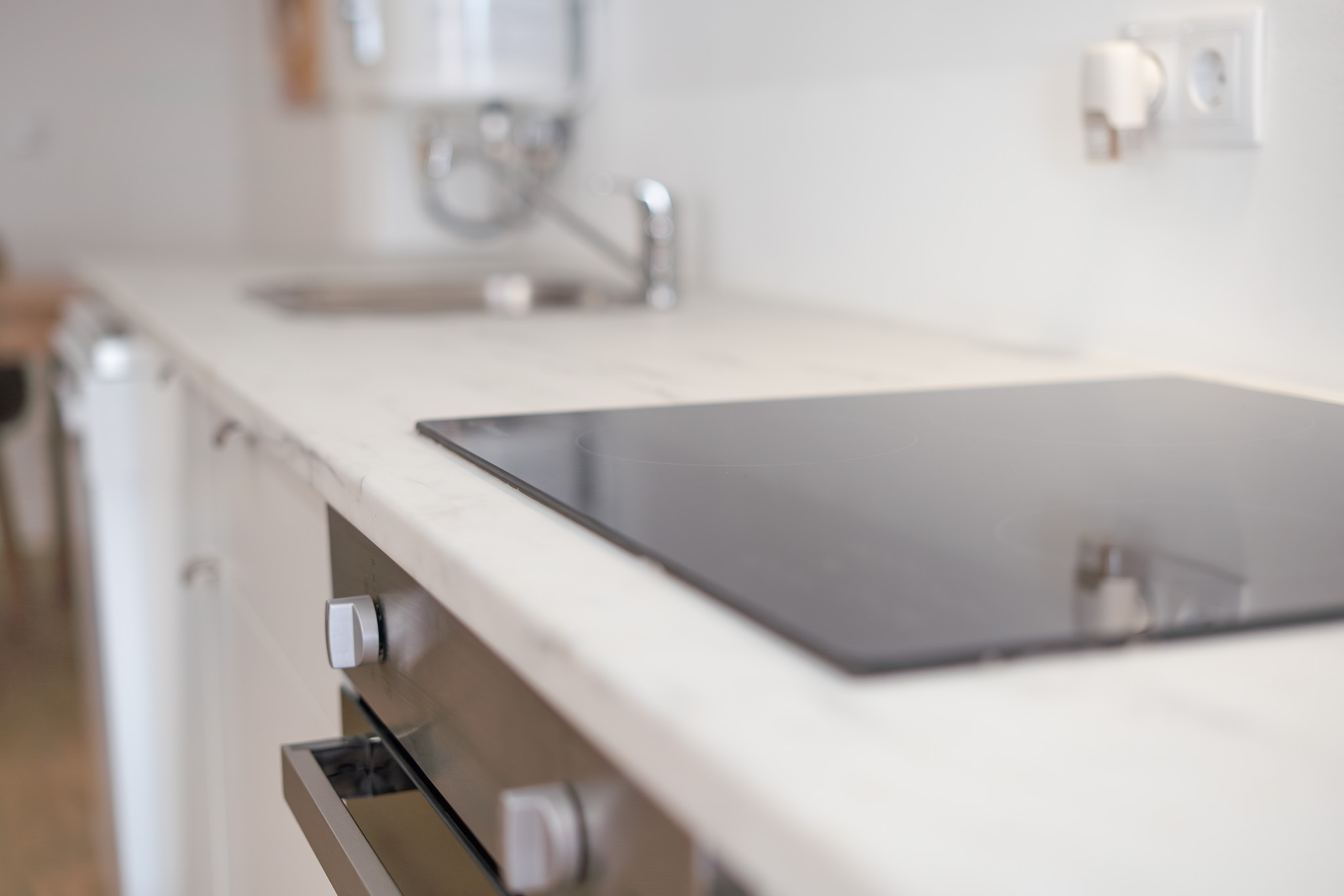 Studio kitchen worktop with induction hob and oven